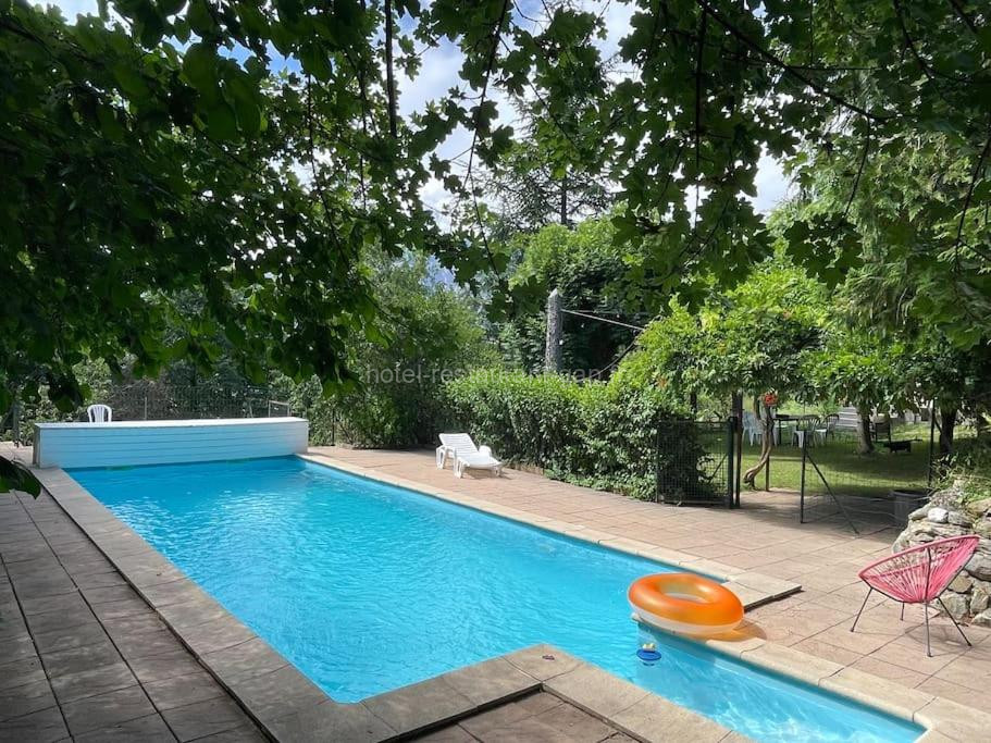 Photo de MARGUERITE GAP Jardin Piscine chauffée